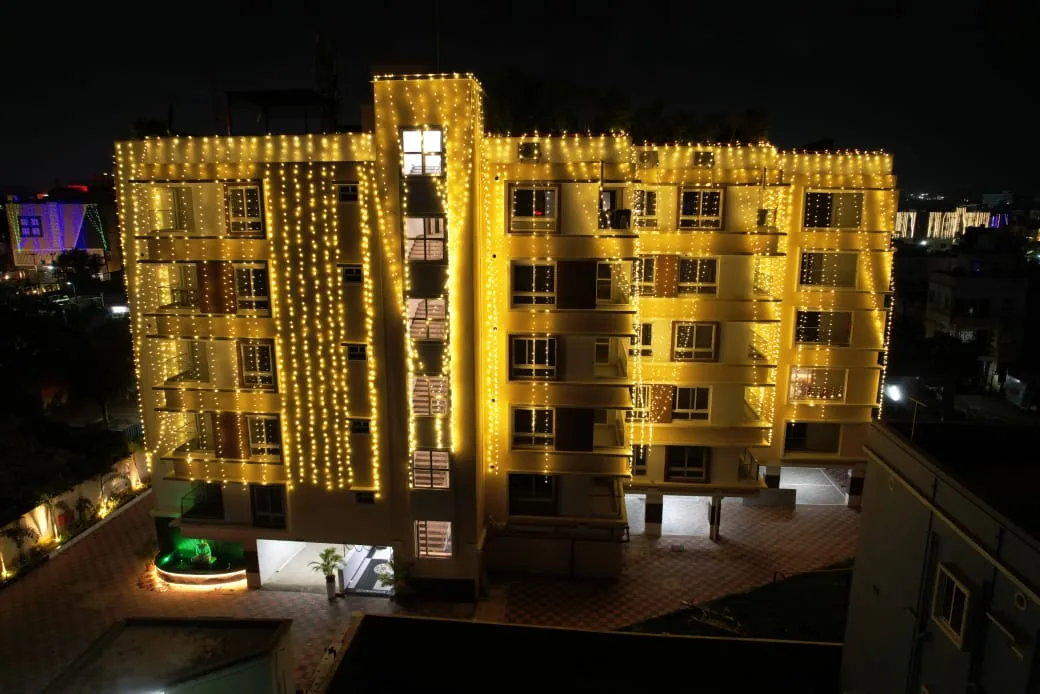 Sugarcane Apartments — illuminated at night